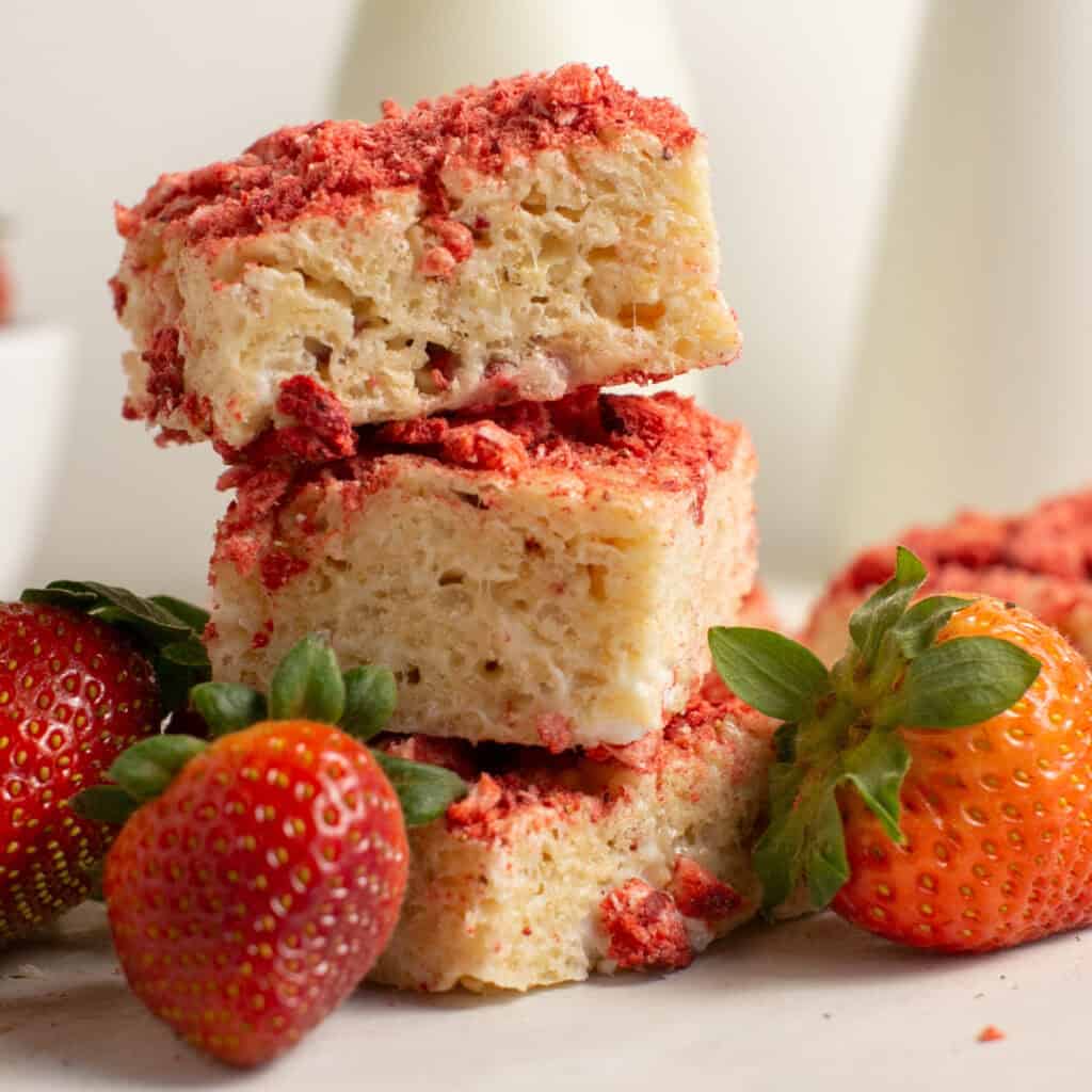 a stack of the strawberries and cream marshmallow bars