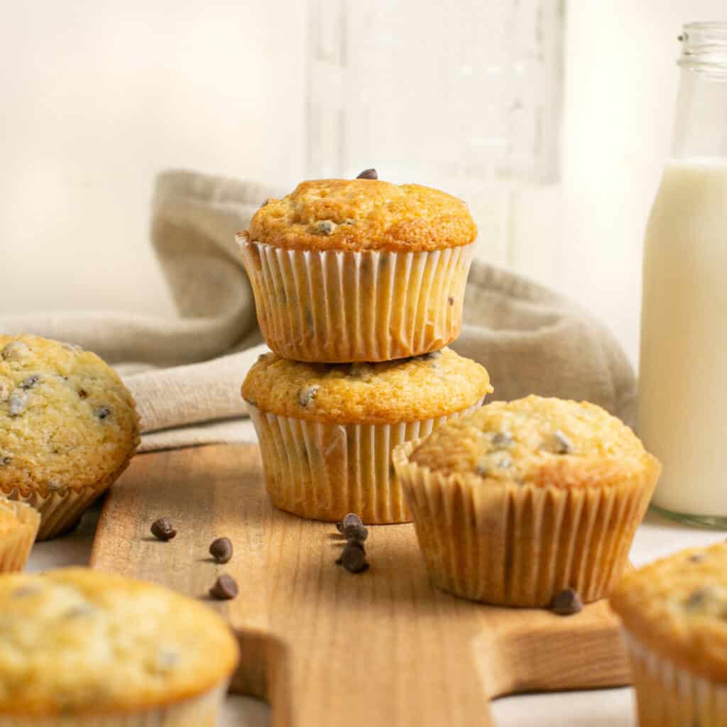 A picture showing stacked chocolate chip muffins