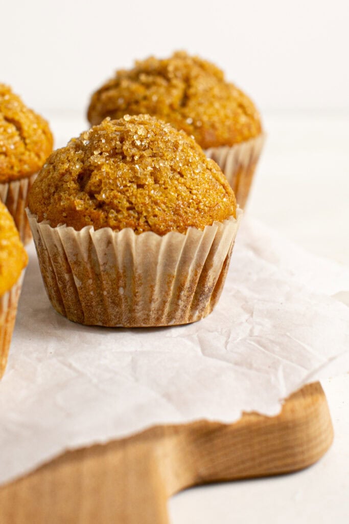 A close up shot of the pumpkin spice muffins so you can see the sugar on top. 