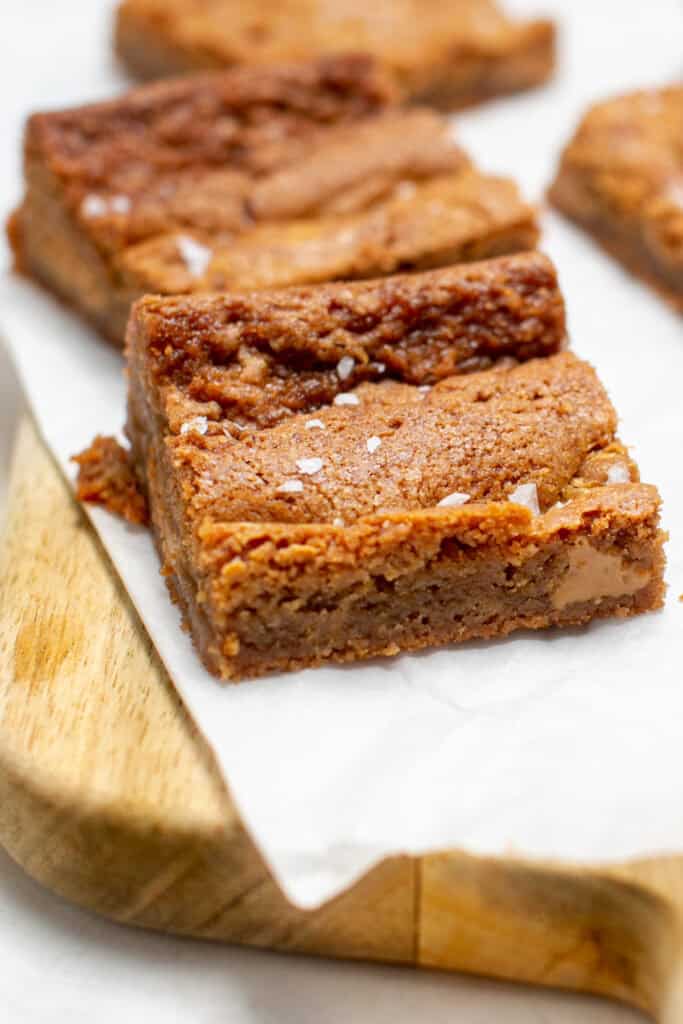A side picture of the peanut butter blondies showing the peanut butter inside.