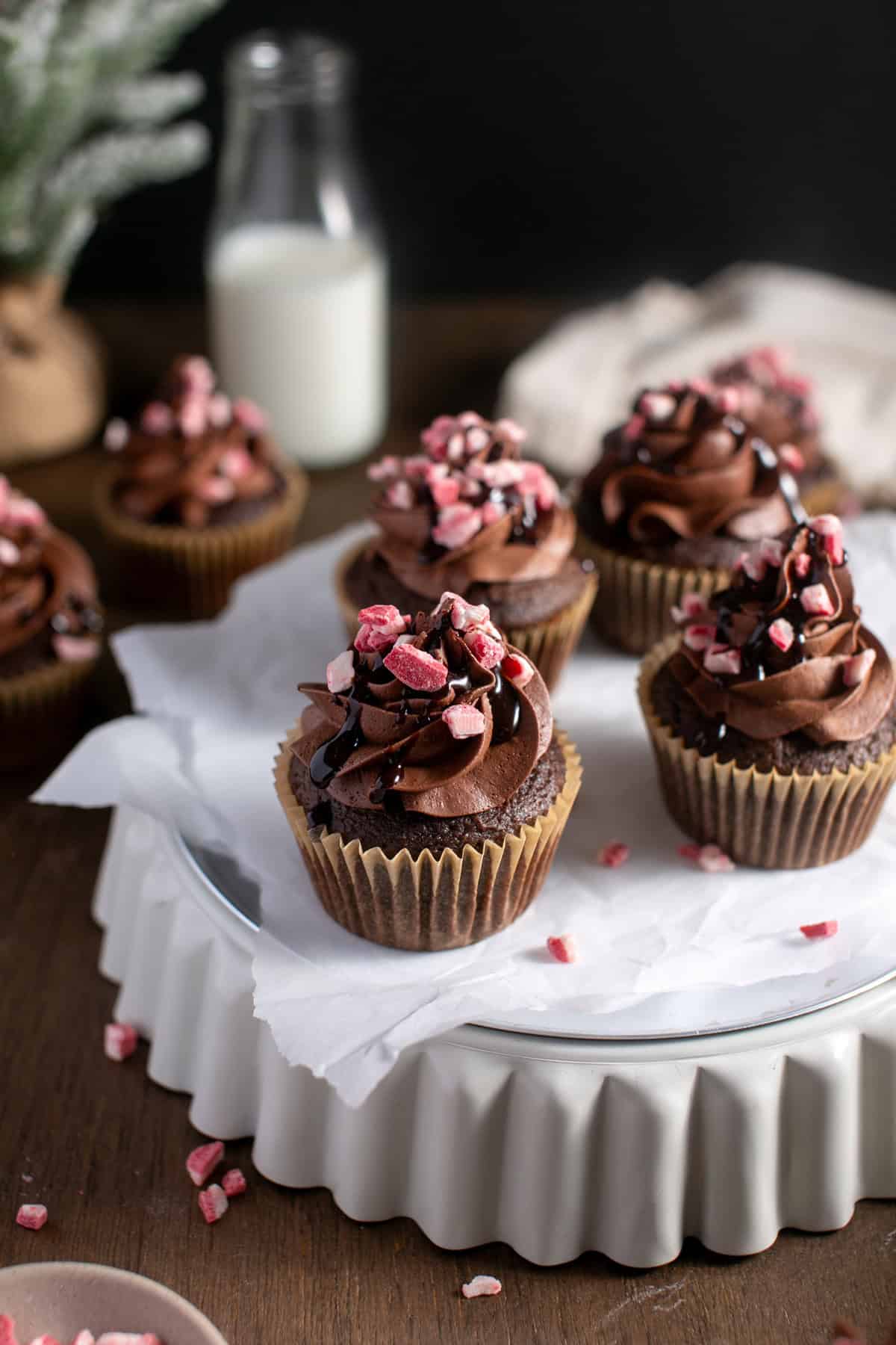 Peppermint Mocha Cupcakes on a piece of parchment paper.