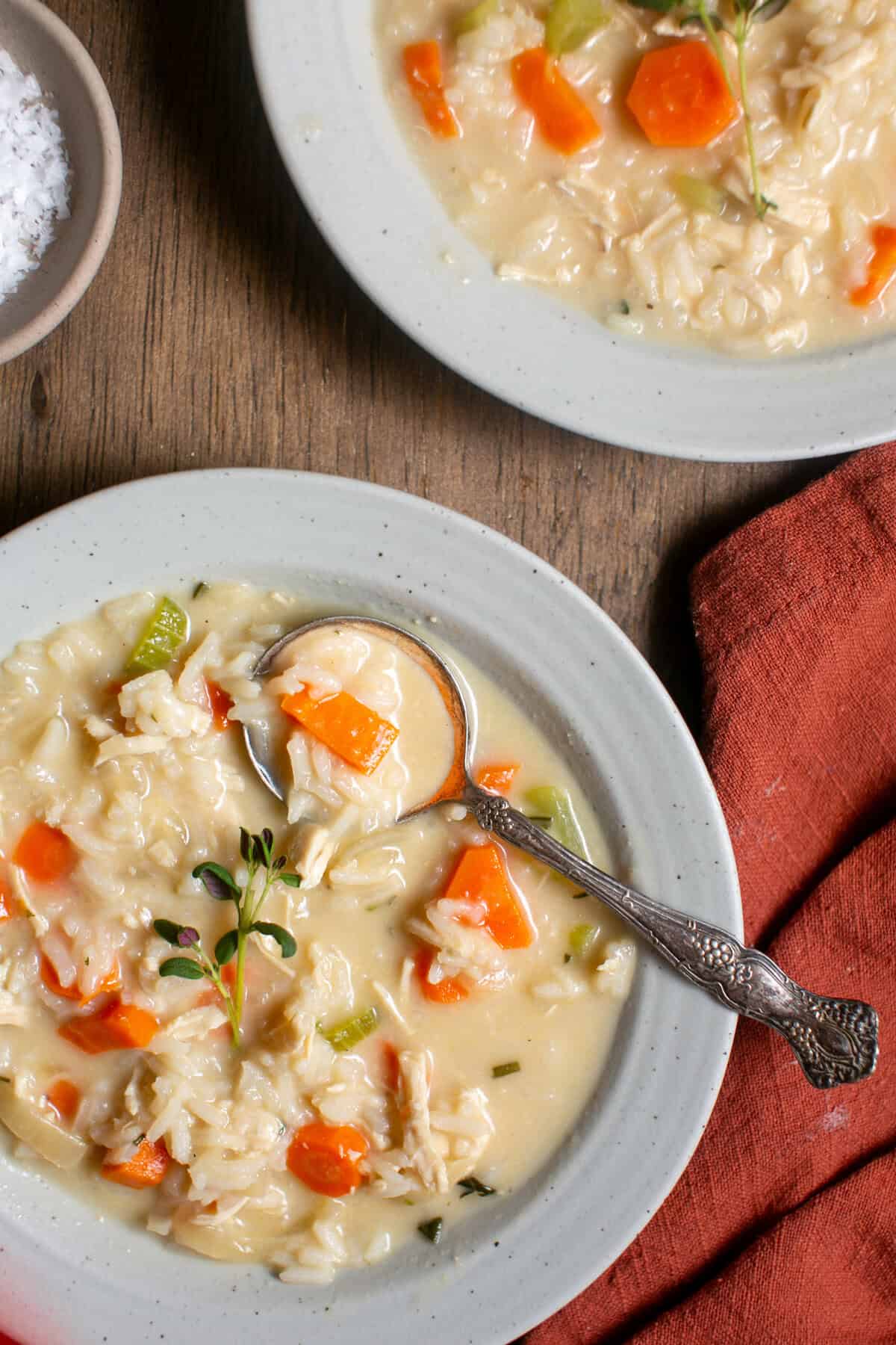 Two bowls of Chicken and rice soup.