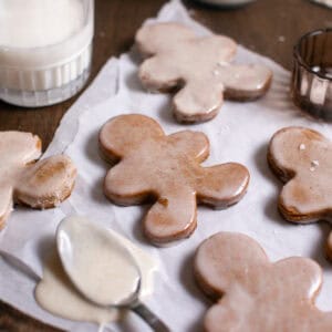 Gingerbread by a glass of milk.