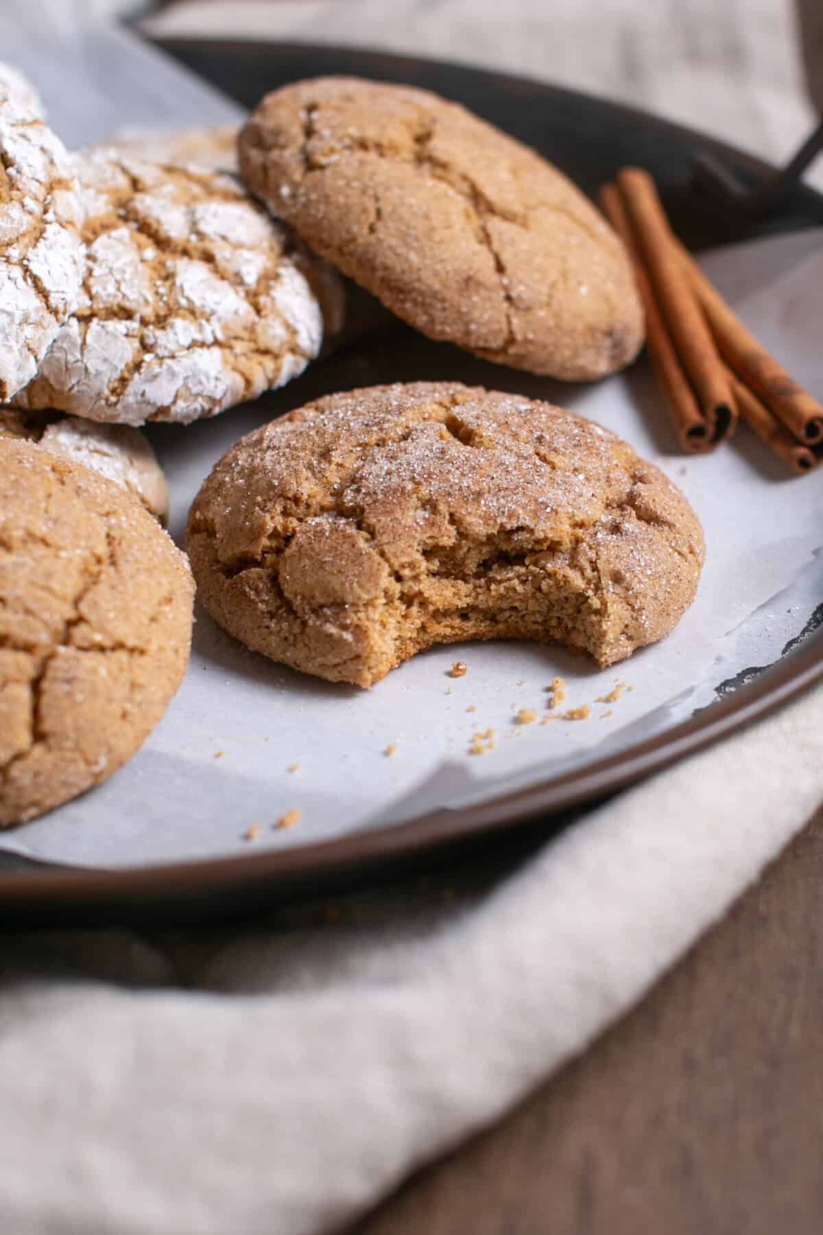 Spice Crinkle Cookies with a bite taken out. 