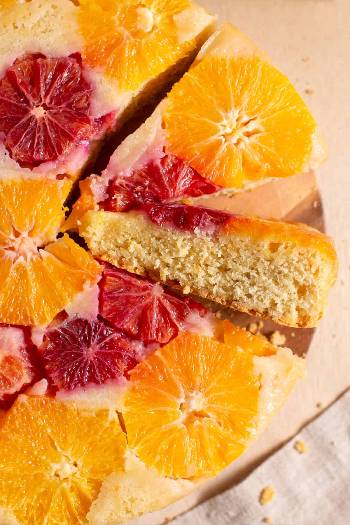 Winter Citrus Cake with slices cut out. 