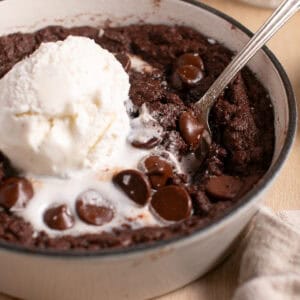 Double Chocolate Skillet Cookie with a spoon in the middle.