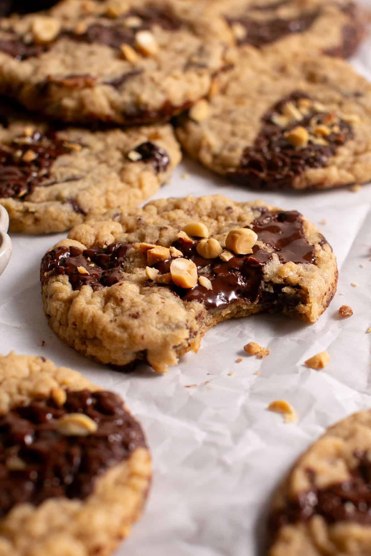 Peanut Butter Banana Cookies with a bite missing and some crumbs.