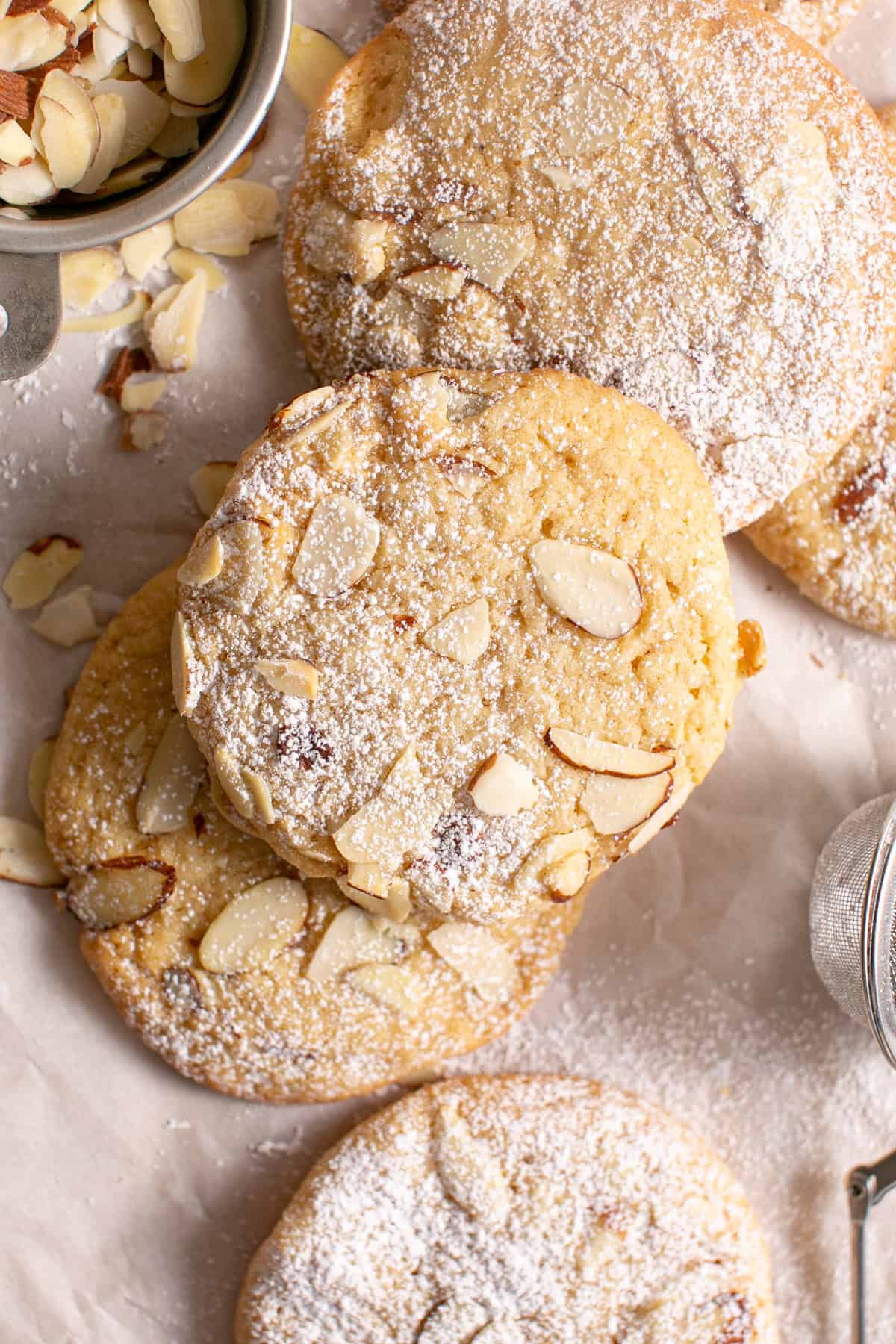 Almond Croissant Cookies stacked on each other. 