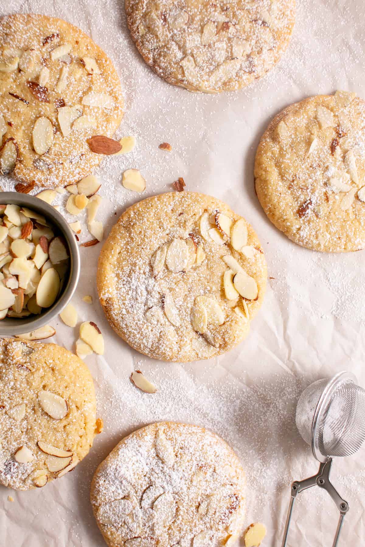 Almond Croissant Cookies with powdered sugar on top.