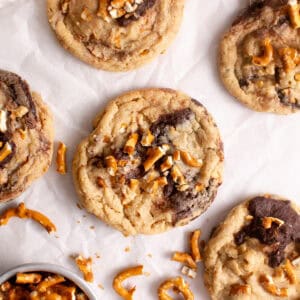 Chocolate Peanut Butter Swirled Cookies on parchment paper.