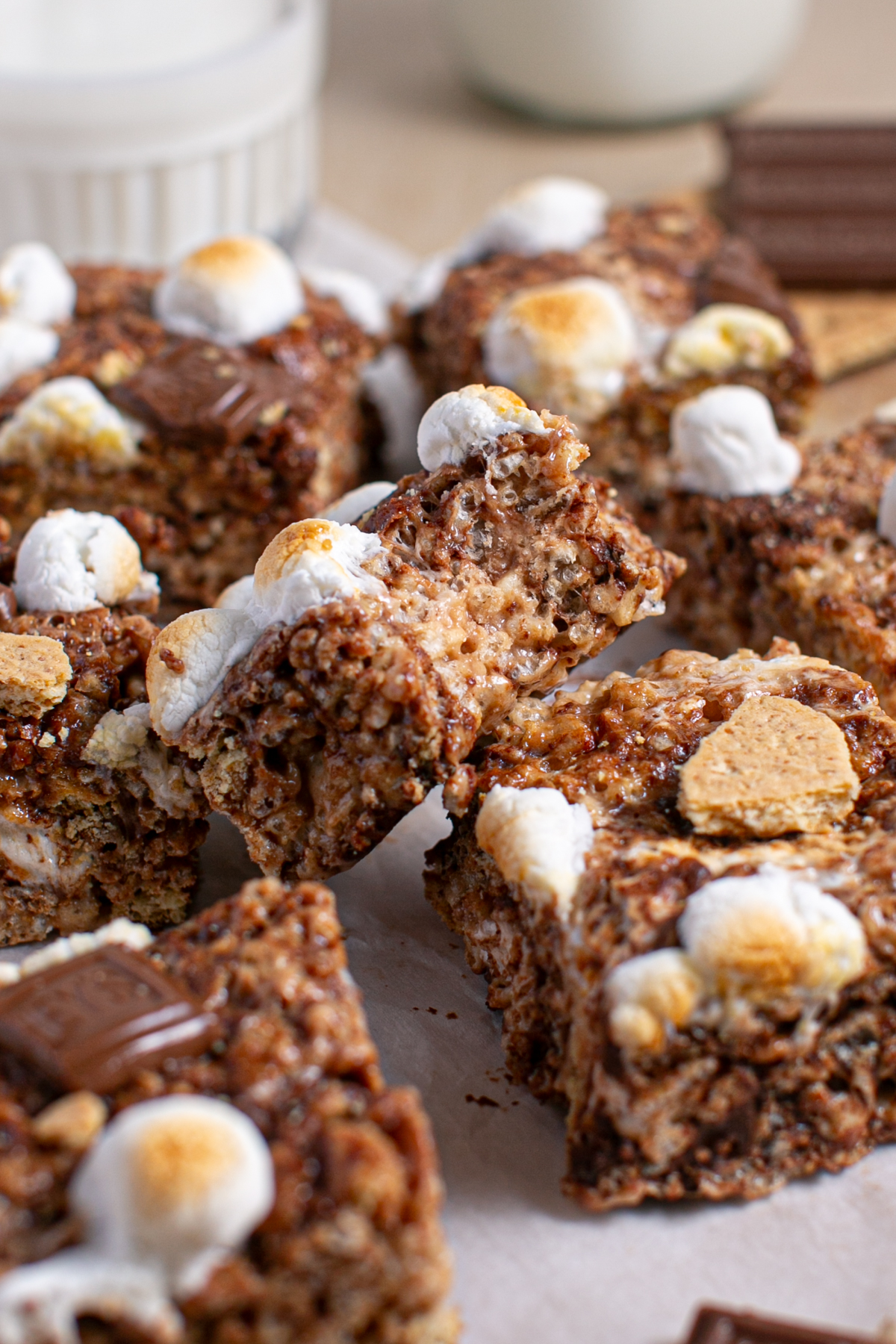 Browned Butter S'mores Rice Krispie Treats with a bite taken out. 