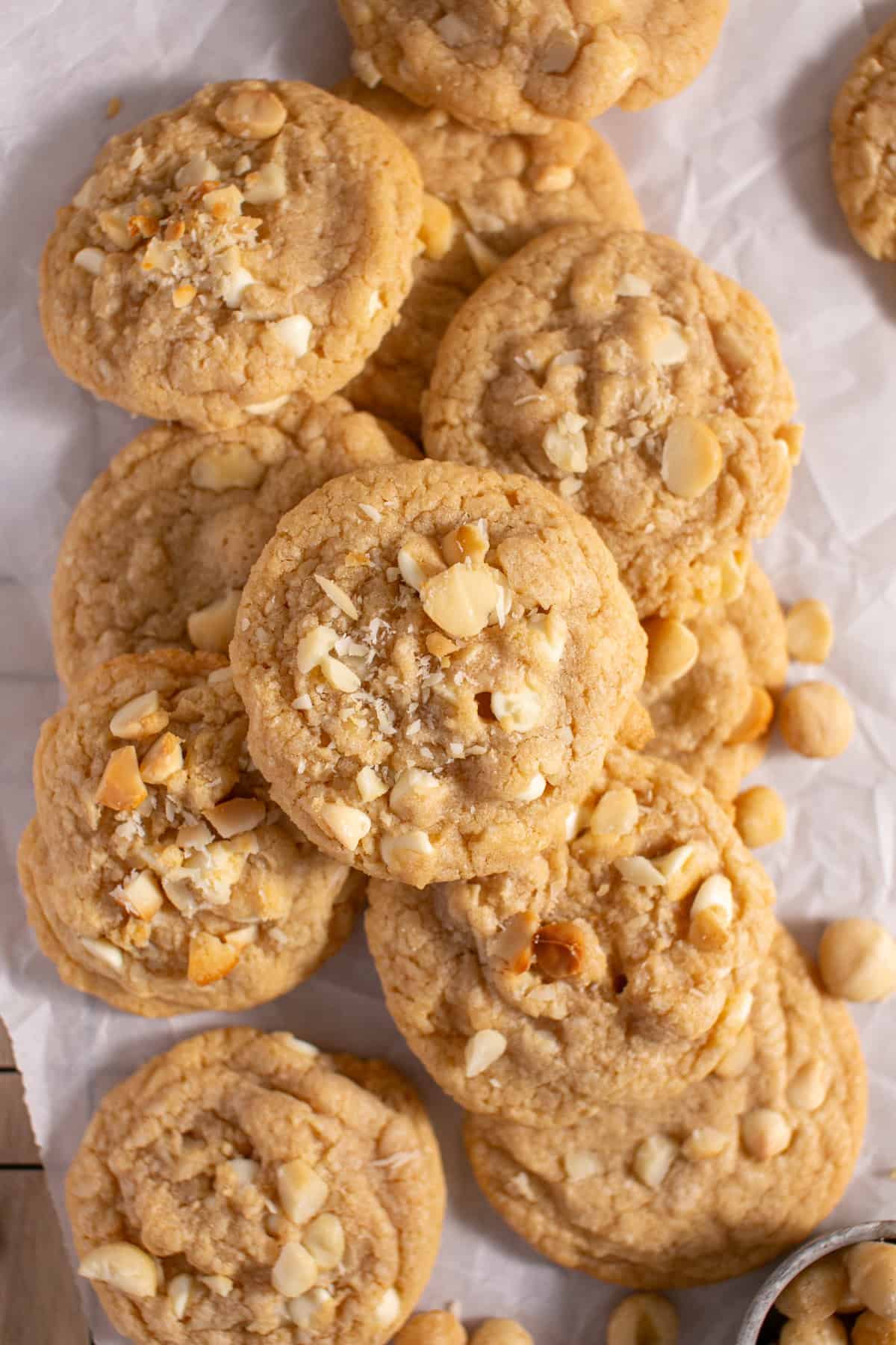 White Chocolate Macadamia Nut Cookies stacked on each other. 