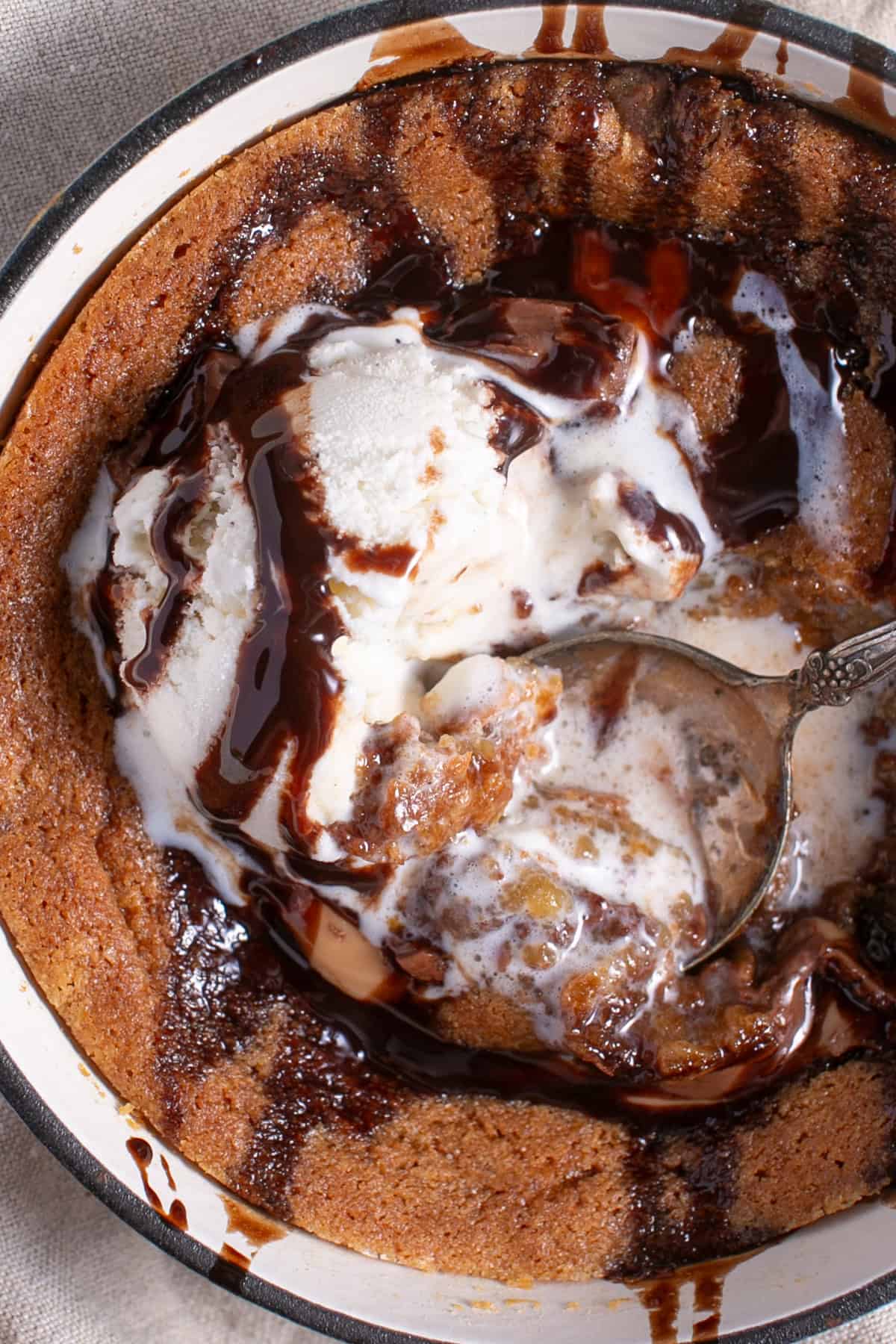 Skillet Chocolate Caramel Cookie with a scoop of ice cream. 