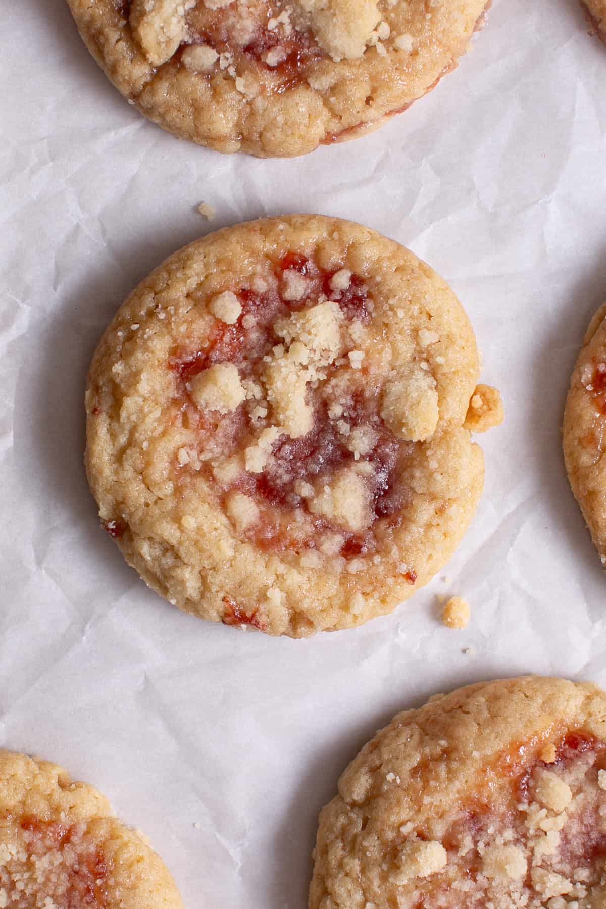Strawberry Crumble Cookies on parchment paper.