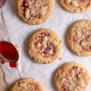 Strawberry Crumble Cookies on parchment paper.