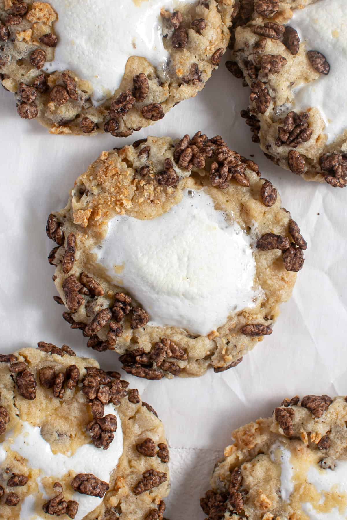 Chocolate Cereal S'mores Cookies on parchment paper. 