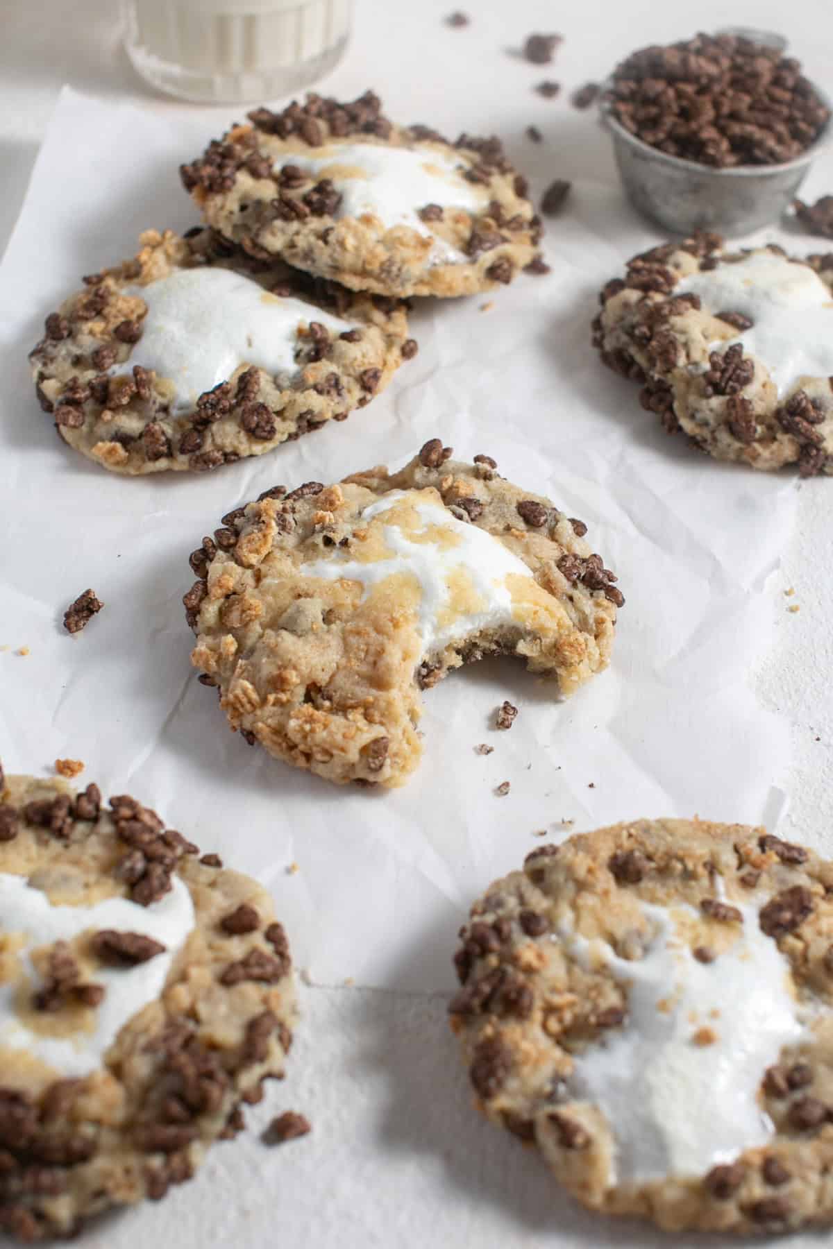 Chocolate Cereal S'mores Cookies with a bite missing. 