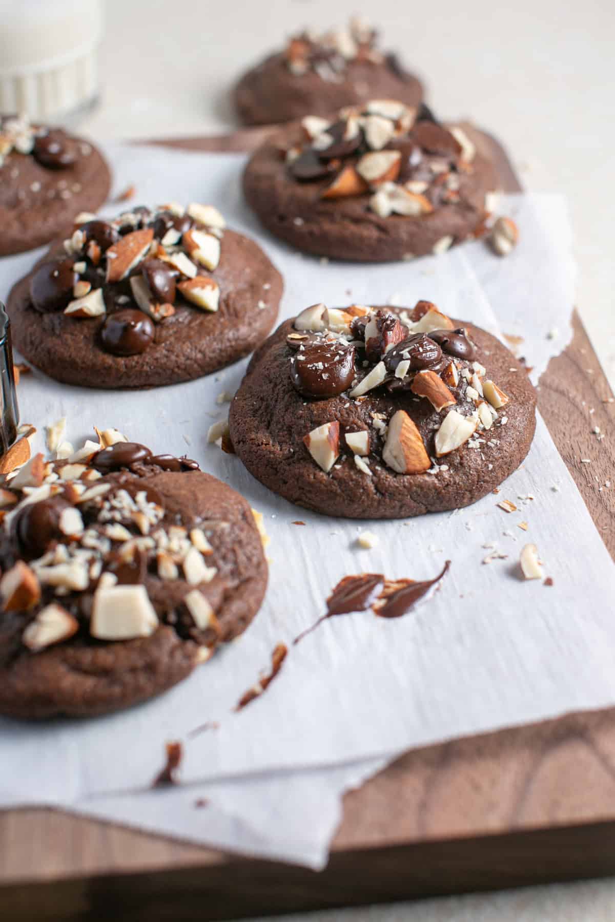 Chocolate coconut cookies on parchment paper. 