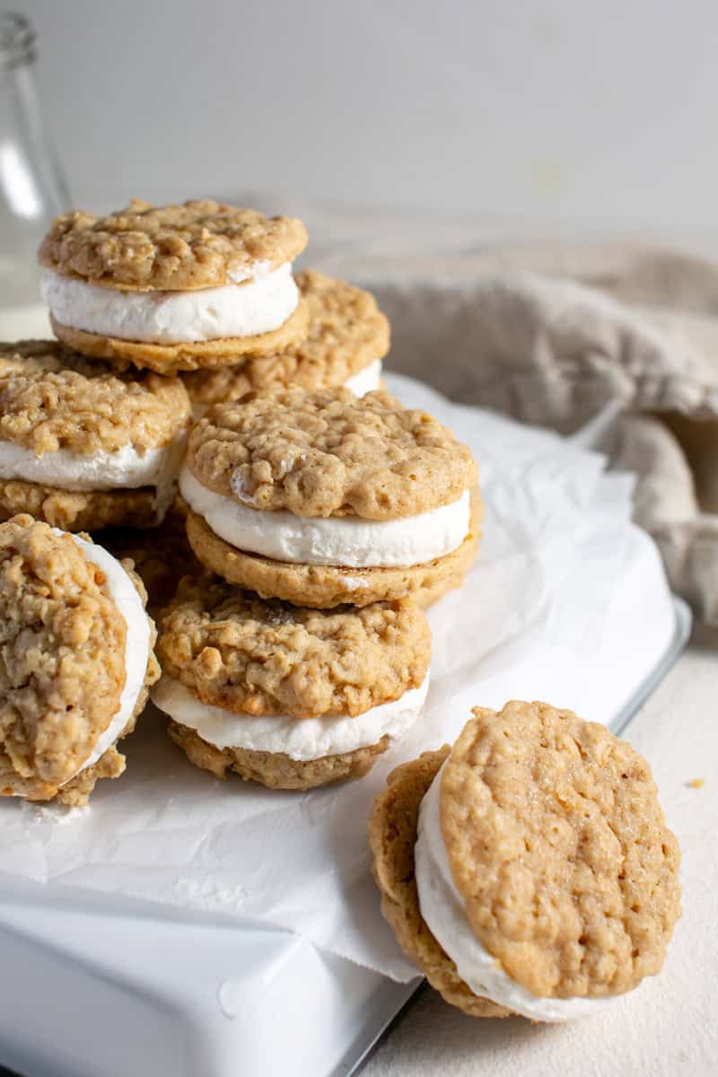 Ice cream sandwich cookies stacked on top of each other. 