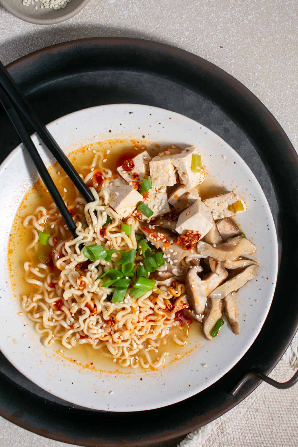 Easy Vegetarian Ramen Recipe with Tofu and Mushroom in a large bowl.