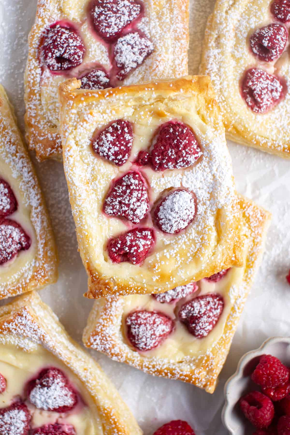 Raspberry Cream Cheese Danish with powdered sugar.