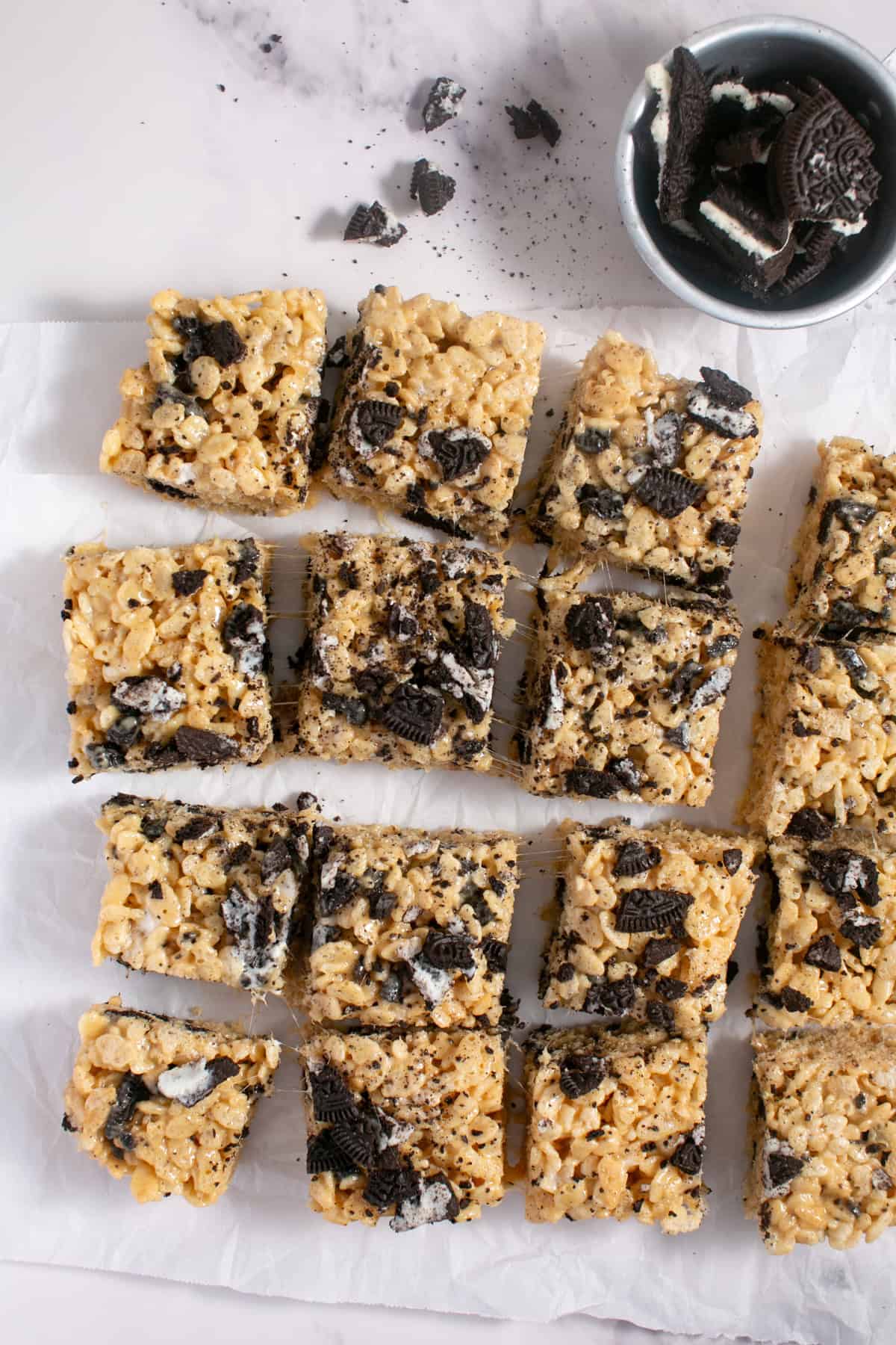 Peanut Butter Oreo Rice Krispie Treats on parchment paper. 