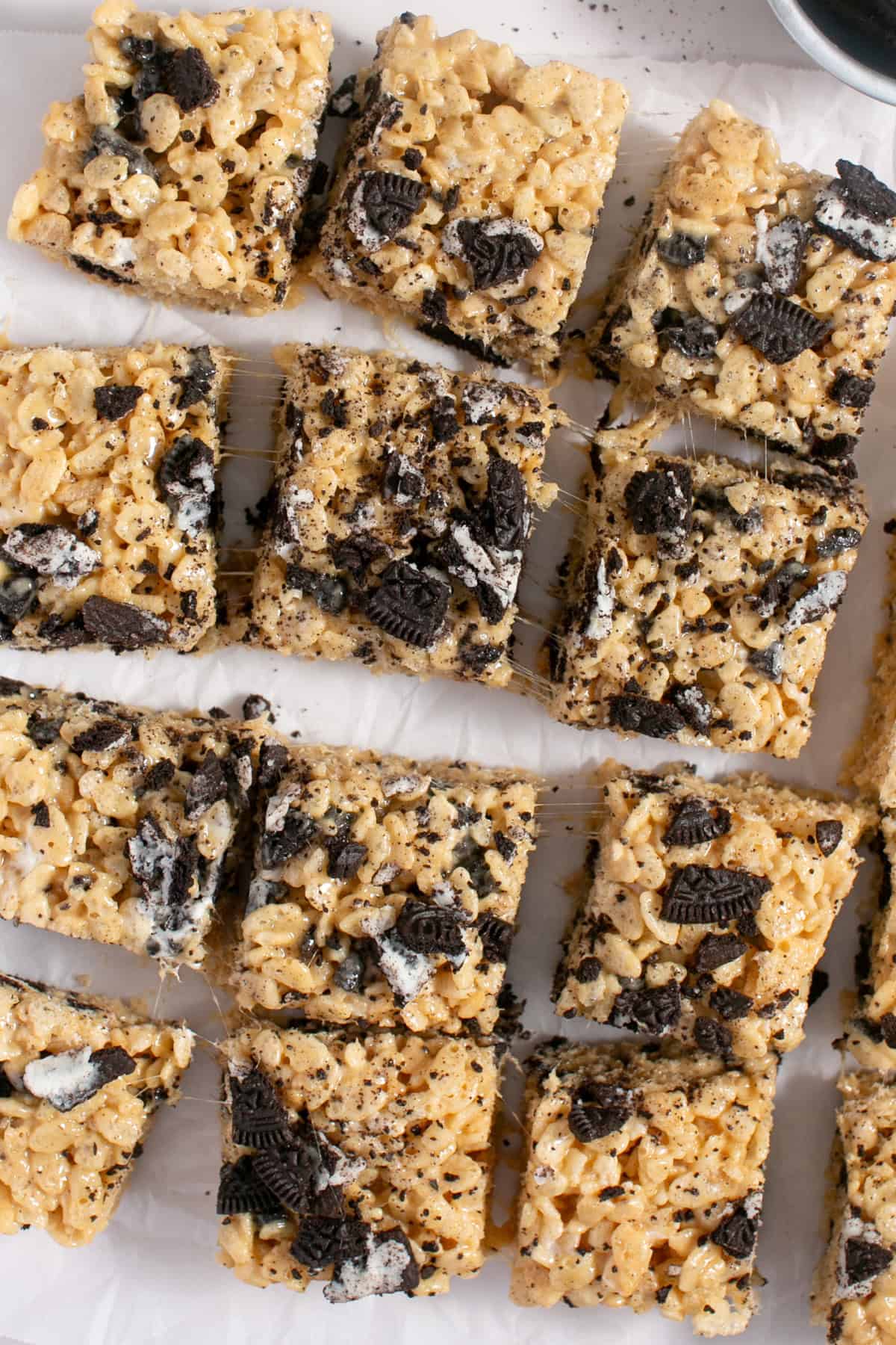 Peanut Butter Oreo Rice Krispie Treats with a marshmallow pull.