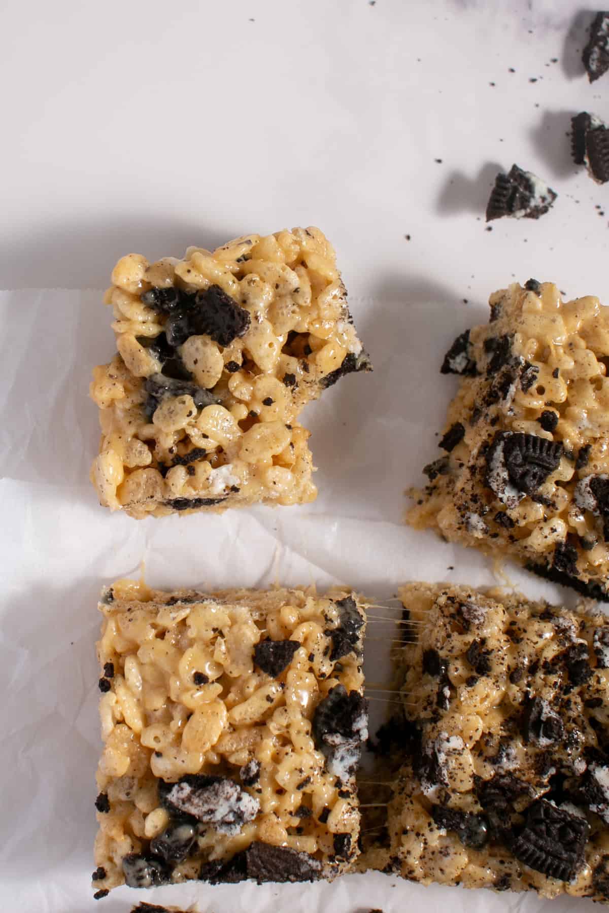 Peanut Butter Oreo Rice Krispie Treats with a bite missing. 