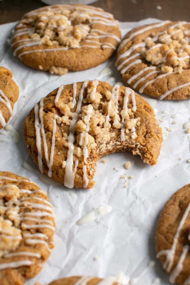 Pumpkin Coffee Cake Cookies with crumbs beside it. 