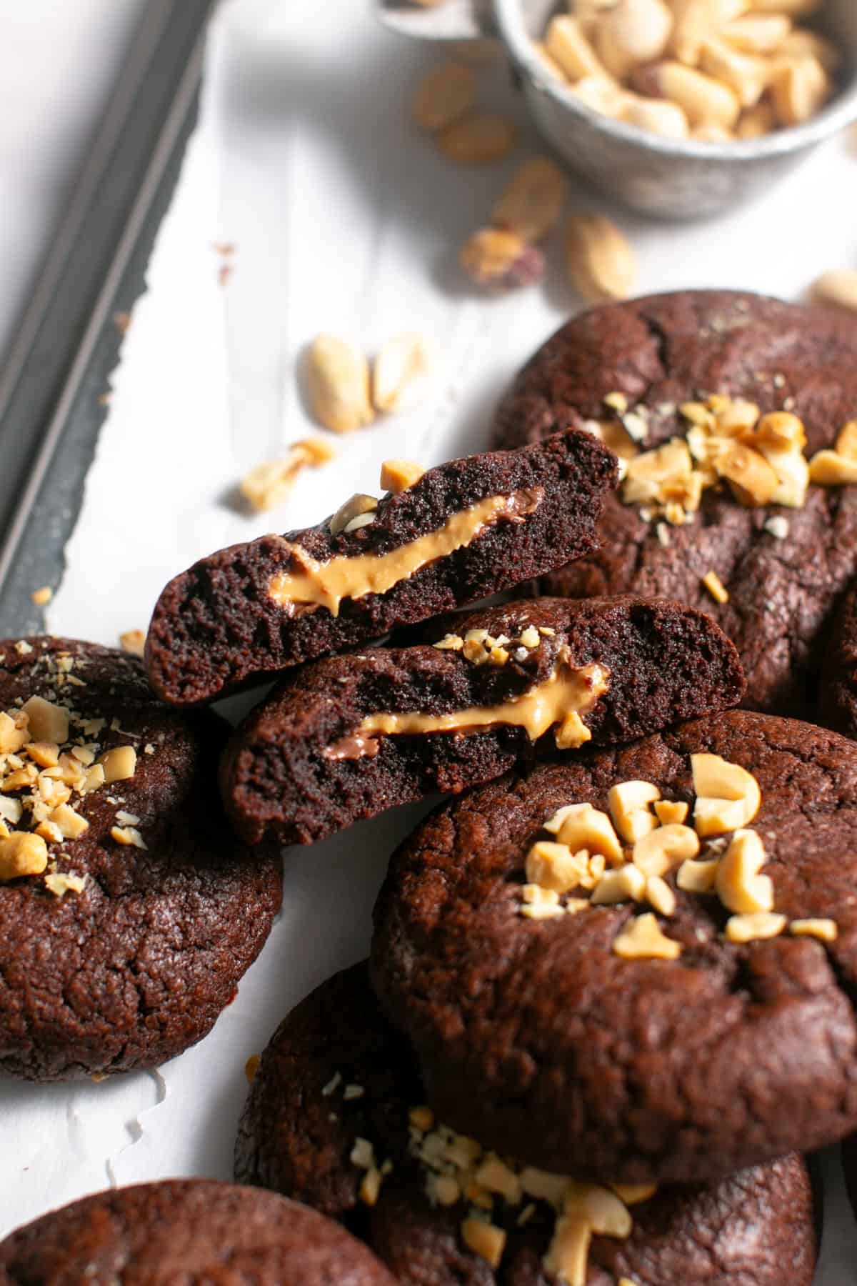 Peanut Butter Nutella Stuffed Cookie broken in half. 