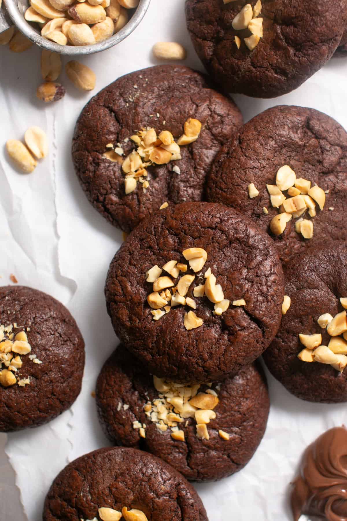 Peanut Butter Nutella Stuffed Cookies stacked on top of each other. 