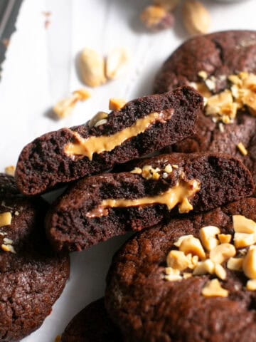 Peanut Butter Nutella Stuffed Cookie Recipe with Peanuts broken in half.