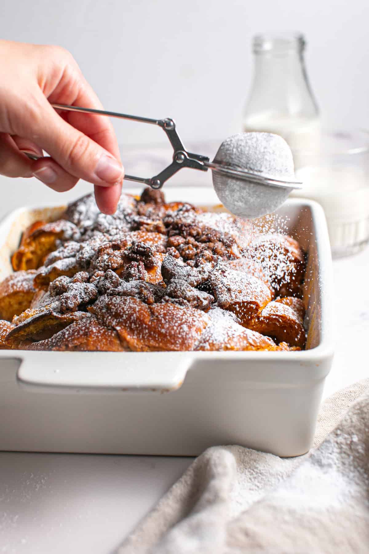 Pumpkin French Toast Bake with a sprinkle of powdered sugar.