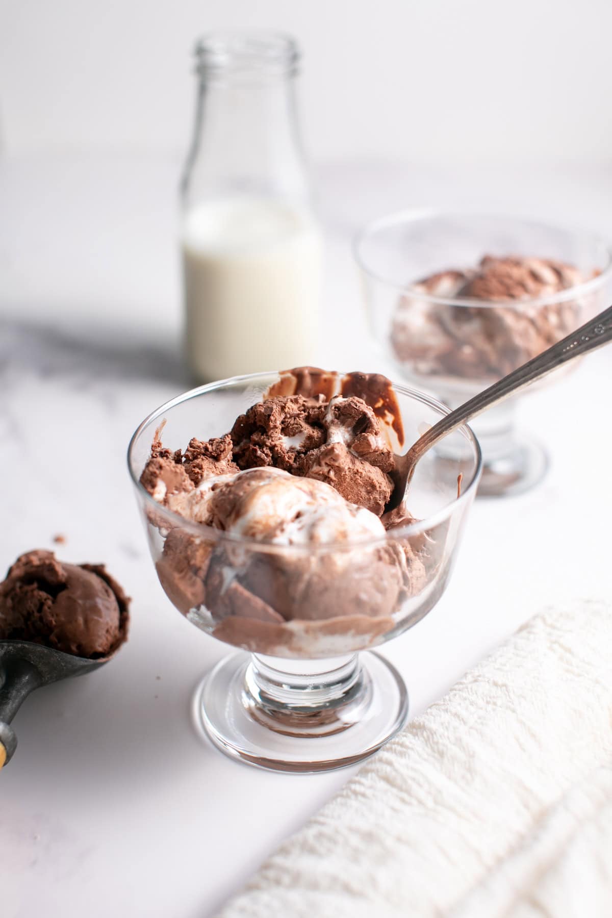 Single Serve Dark Chocolate Marshmallow Ice Cream in a glass bowl with a spoon. 