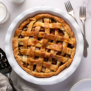 Easy Holiday Apple Pie with a glass of milk.