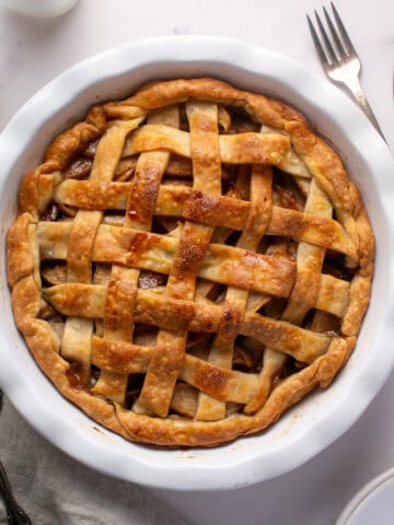 Easy Holiday Apple Pie with a glass of milk.