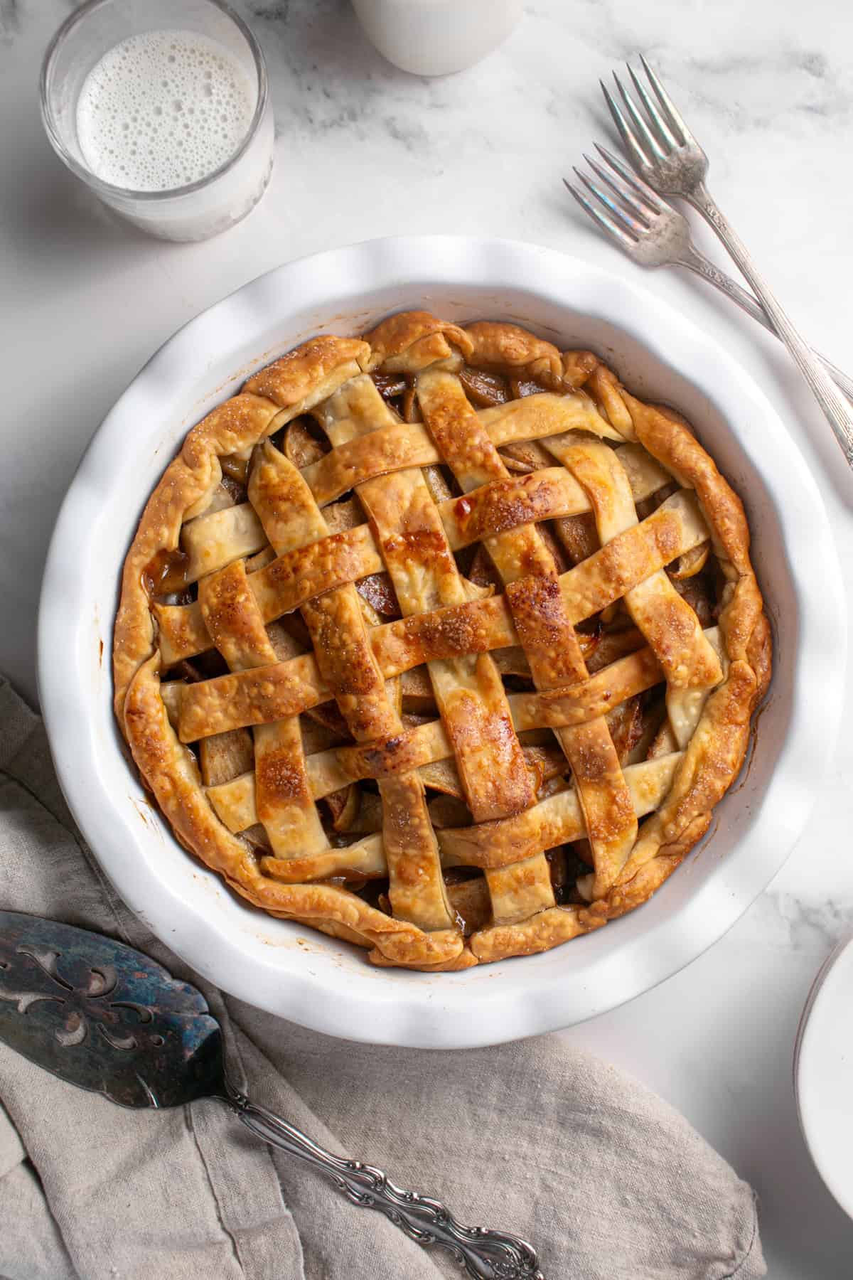 Easy Holiday Apple Pie with a glass of milk.