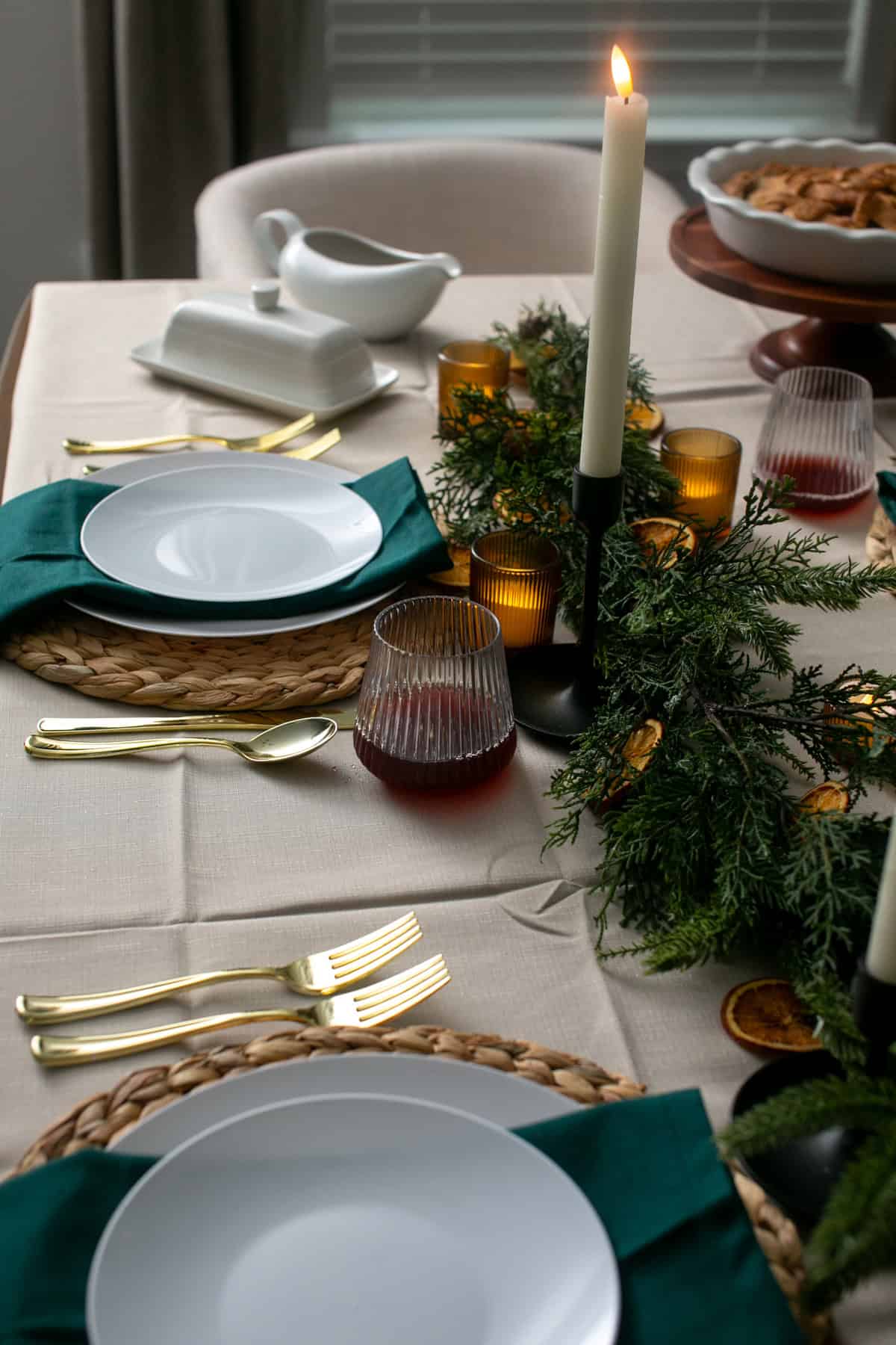 Elevated and Beautiful Thanksgiving Table Decor Ideas with greenery.