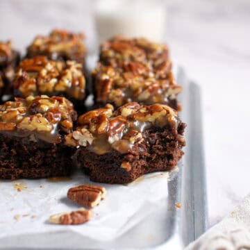 Pecan Pie Brownies with a bite missing.