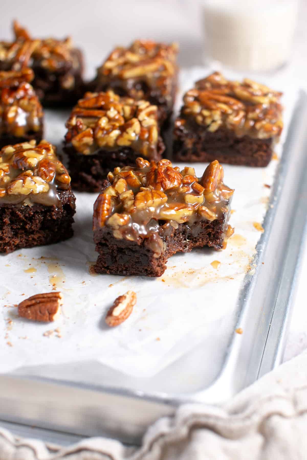 Pecan Pie Brownies with a bite missing.