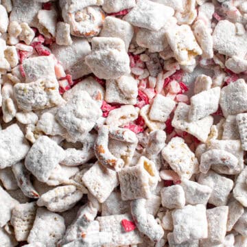 White Chocolate Peppermint Puppy Chow on a sheet pan.