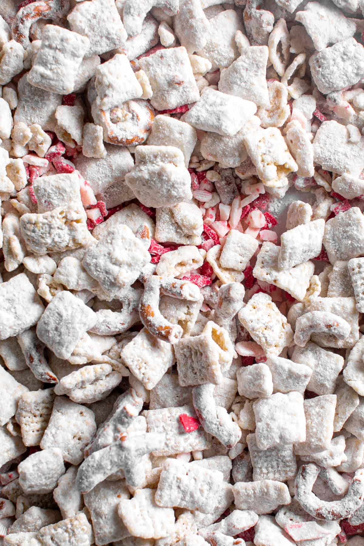 White Chocolate Peppermint Puppy Chow with peppermint pieces.