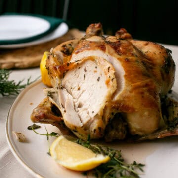 Lemon and Sage Brined turkey being cut.