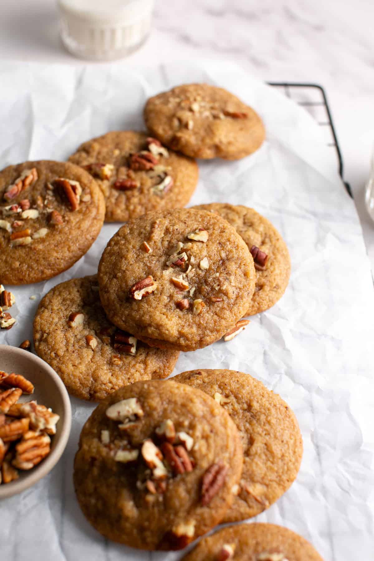 Brown Butter Apple Butter Cookies with Pecans on parchment paper. 