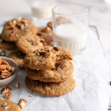 Brown Butter Apple Butter Cookies with Pecans by a glass of milk.