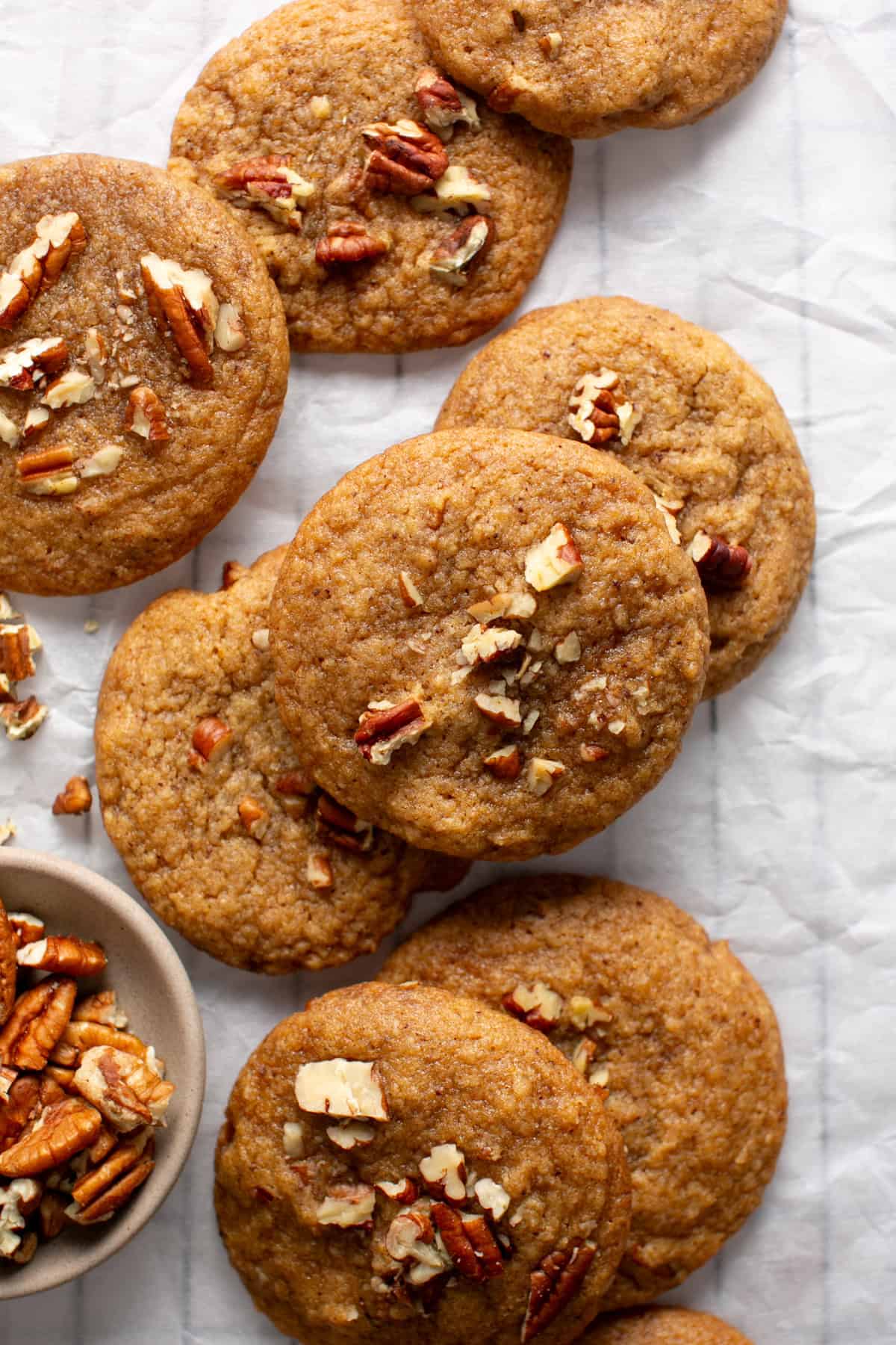 Brown Butter Apple Butter Cookies with chopped pecans on top.