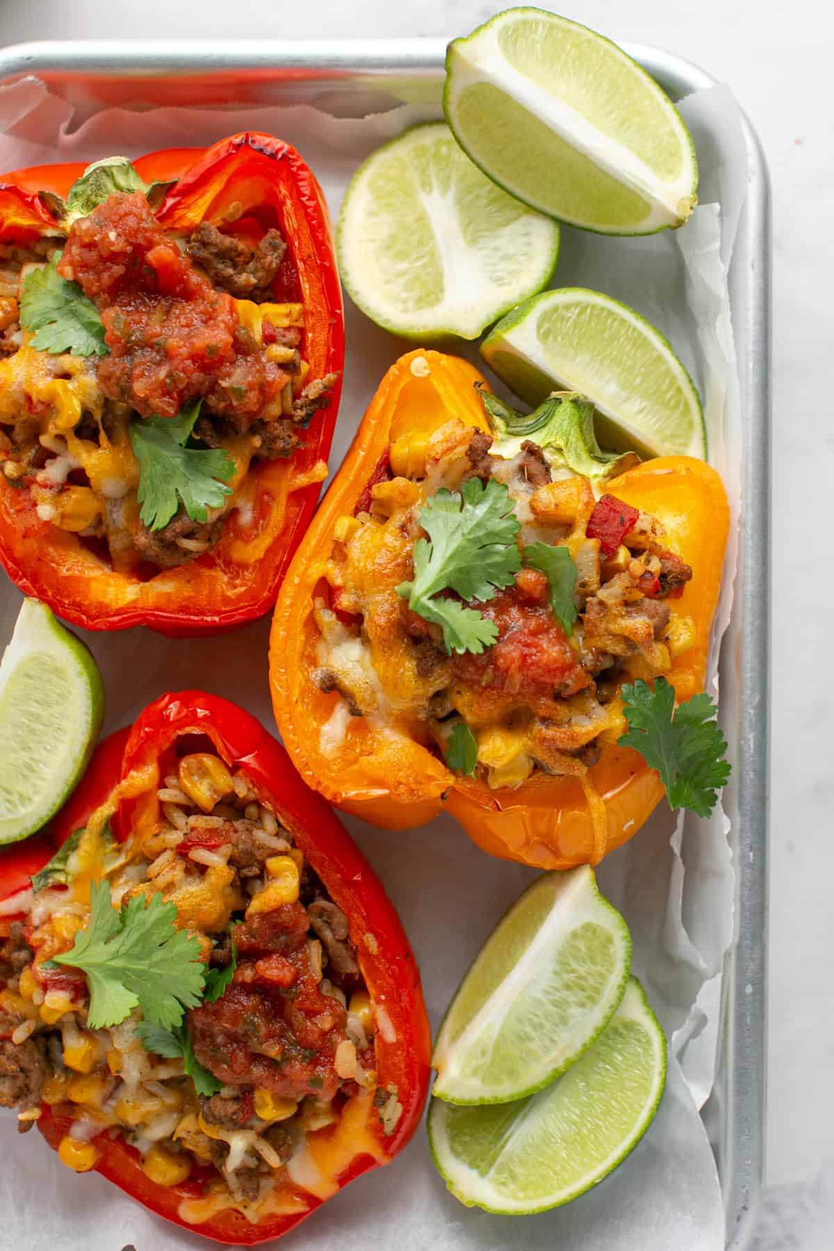 Beef Stuffed Bell Peppers on a sheet tray.