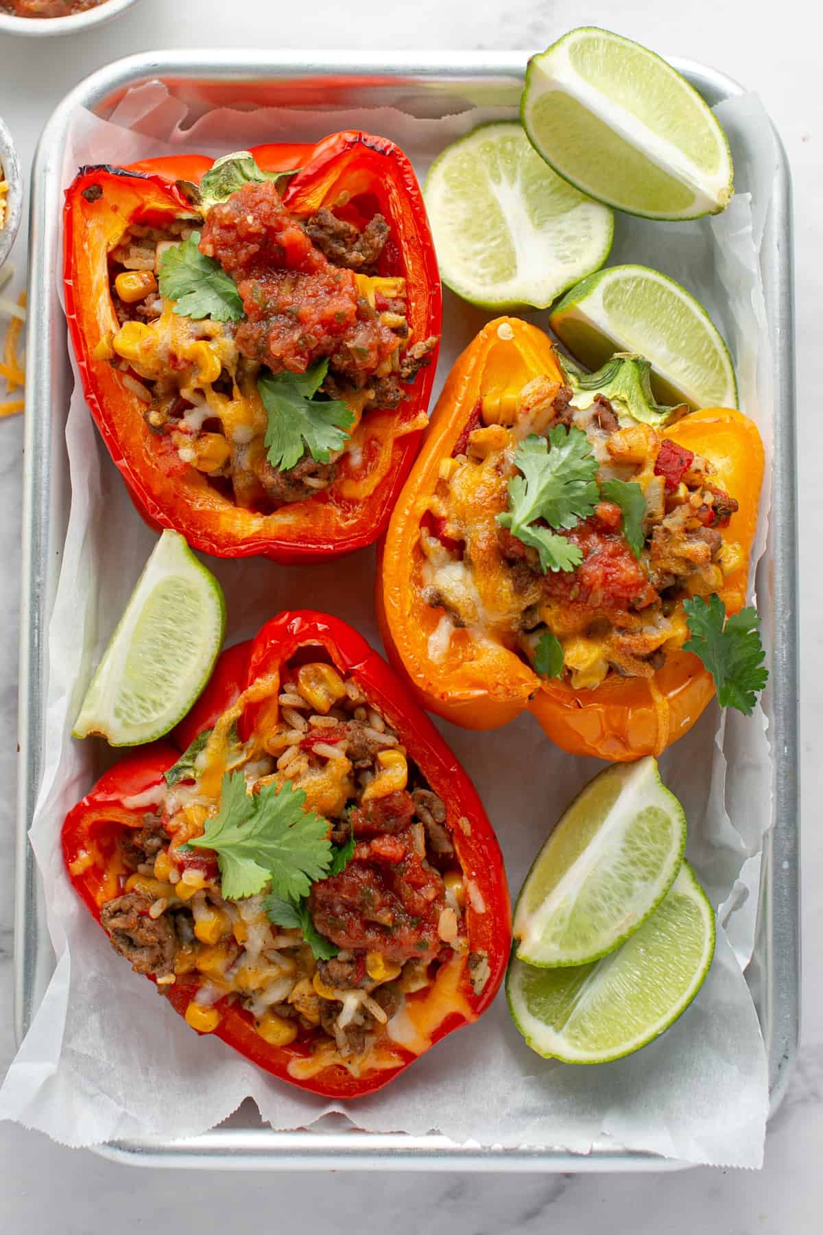 Beef Stuffed Bell Peppers with parchment paper.