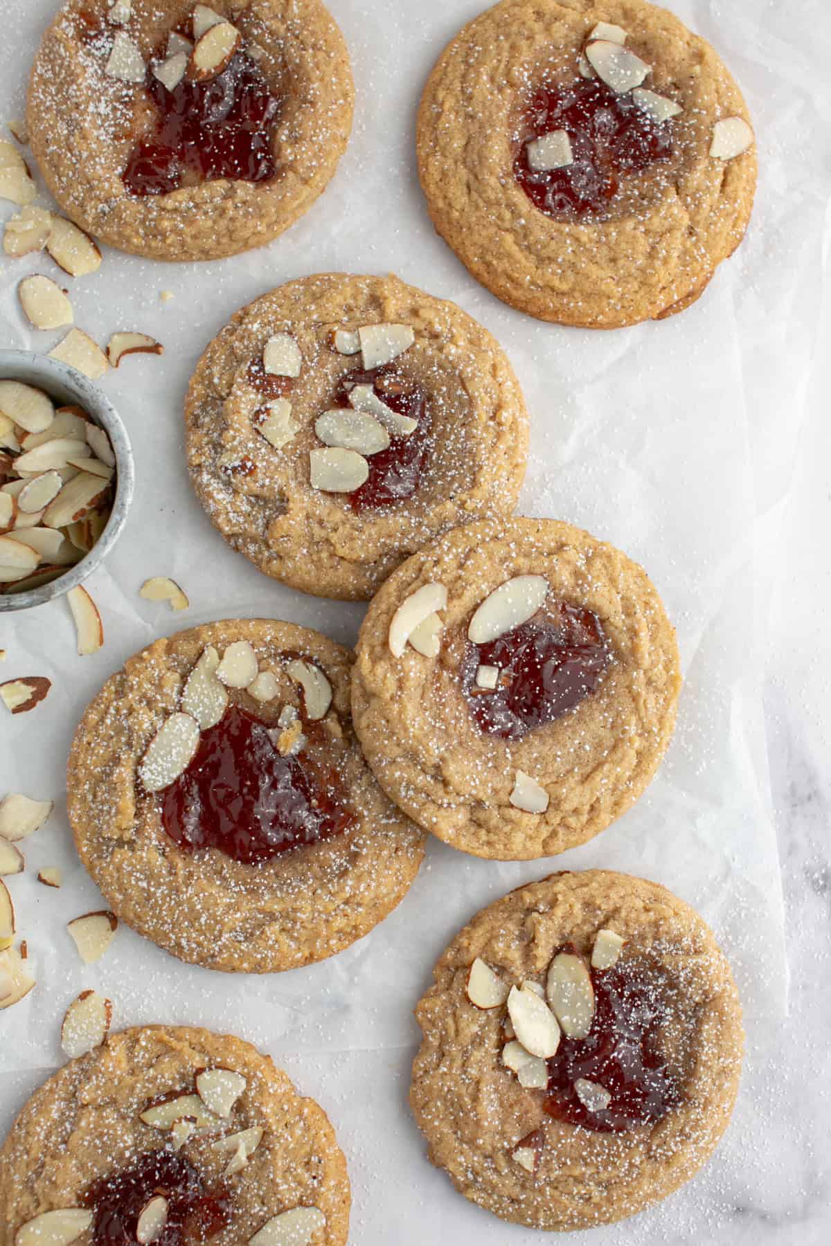 Almond Butter and Jelly Thumbprint Cookie with a sprinkle of almonds.