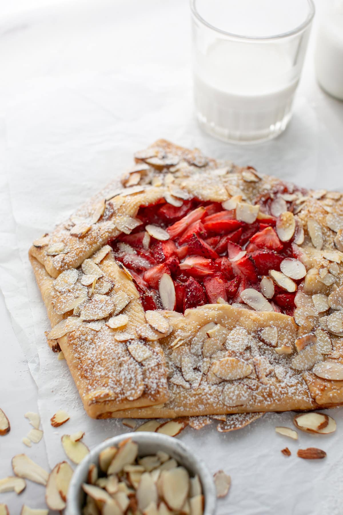 Strawberry Almond Galette on parchment paper.